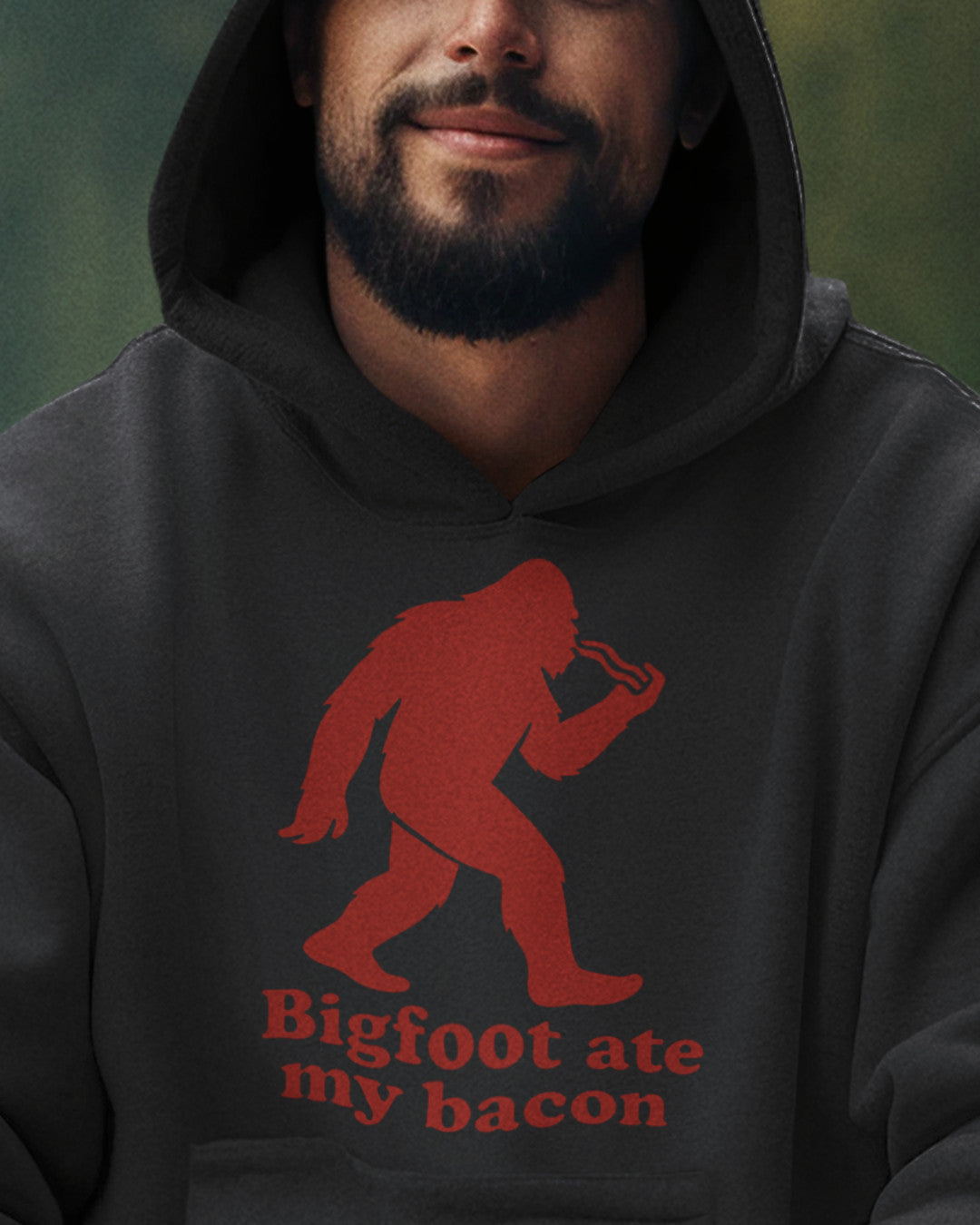 man wearing a  Bigfoot Ate My Bacon Hoodie